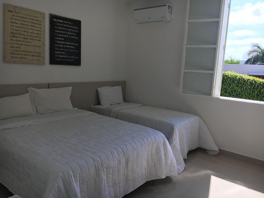 Pousada Suites Do Lago กาปีตอลิโอ ภายนอก รูปภาพ